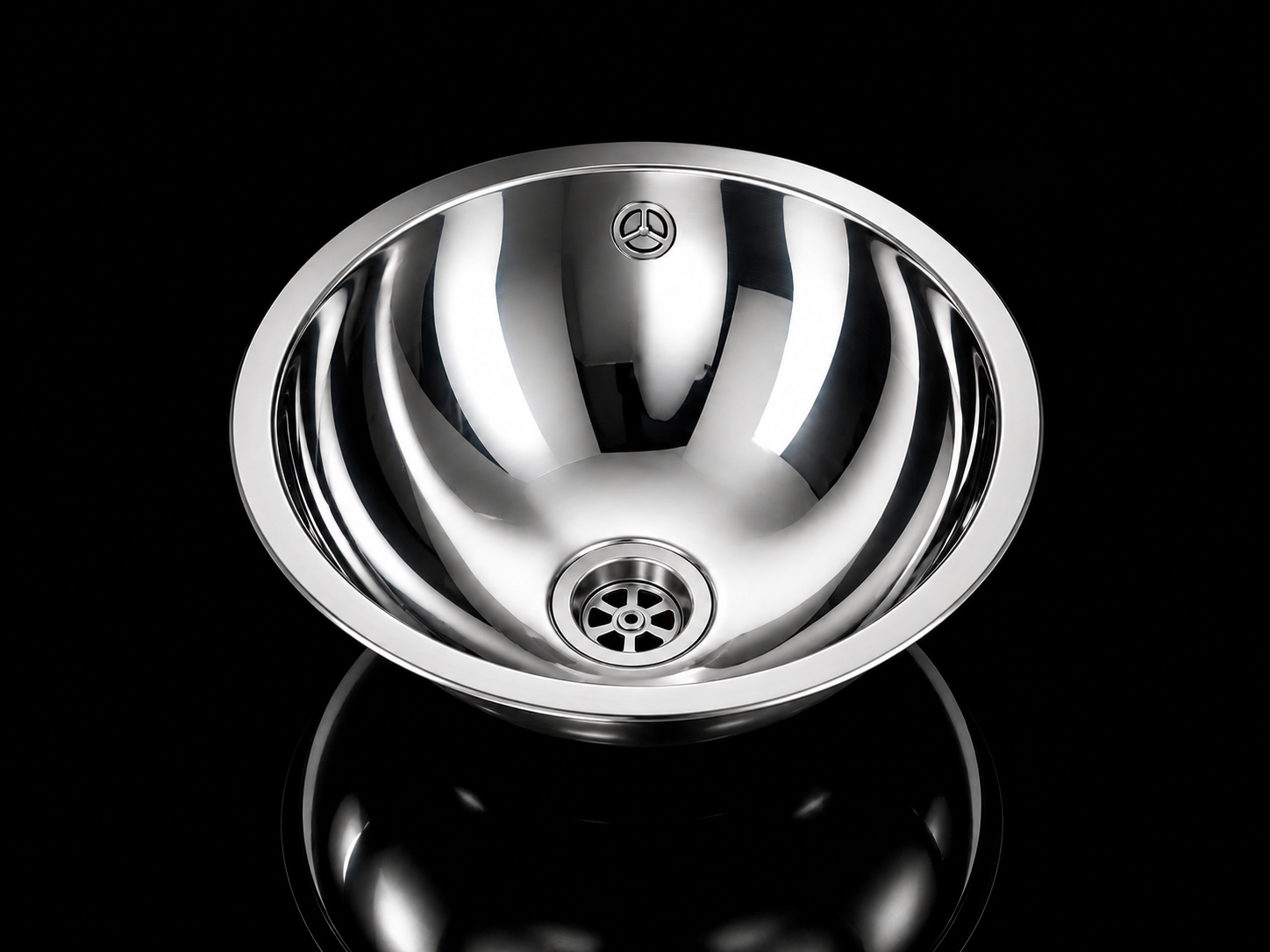 SHIGO Edelstahl-Handwaschbecken Ø260 mm – V2A, mit Überlauf Glänzendes Spülbecken aus Edelstahl mit Abfluss, das Licht vor schwarzem Hintergrund reflektiert.
